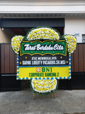 Papan Bunga Duka di Mokoni