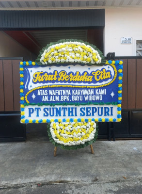 Papan Bunga Duka di Mokoni