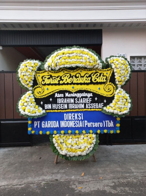 Papan Bunga Duka di Mokoni